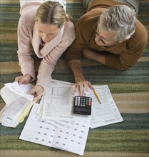 Couple preparing taxes.