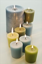 Assorted lit candles.