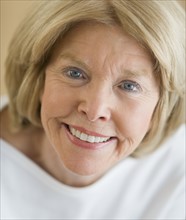Close up of senior woman smiling.