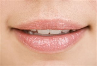 Close up of woman’s mouth.