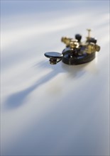 Telegraph key on table.