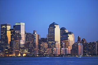New York City skyline along Hudson River at night, New York, United States. Date : 2008