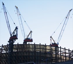 Cranes on construction site, New York City, New York, United States. Date : 2008