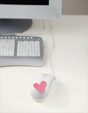 Heart on computer mouse. Date : 2008