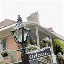 Street lamp and beads, French Quarter, New Orleans, Louisiana, United States. Date : 2008