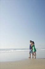 Couple standing on beach. Date : 2008