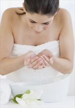 Woman washing face. Date : 2008