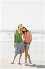 Two women standing on beach. Date : 2008