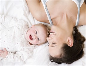 Mother and baby laughing. Date : 2008