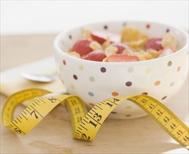 Close up of cereal and measuring tape. Date : 2008