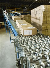Packages on conveyor belt in warehouse. Date : 2008