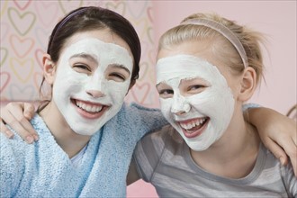 Girls with facial treatment laughing. Date : 2008