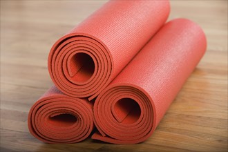 Stack of rolled yoga mats. Date : 2008