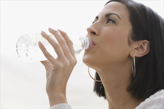 Woman drinking water. Date : 2008