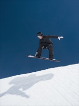 Man on snowboard in air. Date : 2008