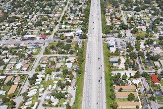 Aerial view of highway through residential area, Florida, United States. Date : 2008