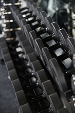 Close up of rows of free weights. Date : 2008