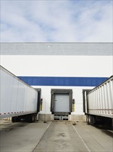 Trucks parked at loading dock. Date : 2008