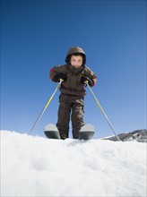 Boy standing on skis. Date : 2008