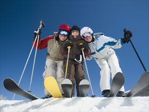 Family standing on skis. Date : 2008