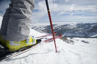 Close up of skier at top of mountain. Date : 2008