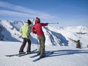 Women standing on skis, Wasatch Mountains, Utah, United States. Date : 2008