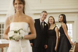 Bride with family in background. Date : 2008