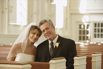 Bride and groom sitting in church. Date : 2008