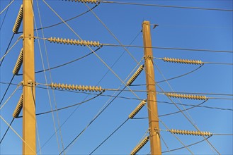 Low angle view of power lines on poles. Date : 2008