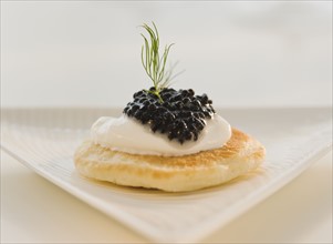 Close up of caviar appetizer.