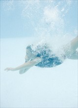 Girl diving underwater. Date : 2008