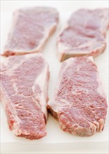 Close up of raw steaks. Date : 2008