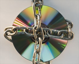 Compact disc locked with metal chain. Date : 2008