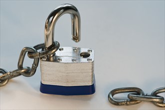 Close up of lock and metal chain. Date : 2008