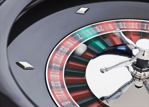 Close up of spinning roulette table.