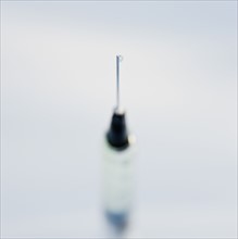 Close up of syringe.