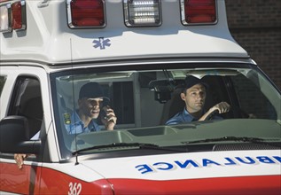 EMT’s driving in ambulance.