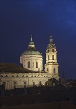 Church illuminated at night.