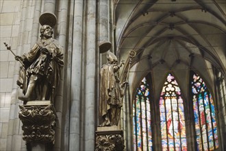 Statues and church interior.