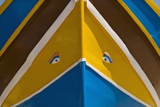 Close up of colorful boat prow.