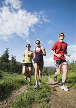 Runners training on mountain trail. Date : 2008