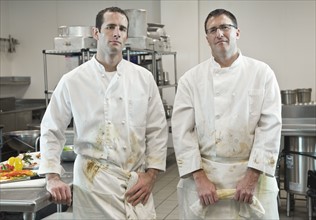 Dirty chefs posing in kitchen. Date : 2008