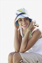 Young woman in sun hat at beach. Date : 2008