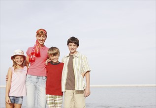 Family posing on beach. Date : 2008