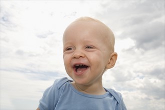 Close up of baby boy laughing. Date : 2008
