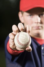 Baseball pitcher holding ball. Date : 2008
