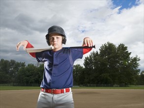 Baseball player posing with bat. Date : 2008