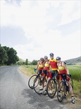 Cyclists posing on country road. Date : 2008