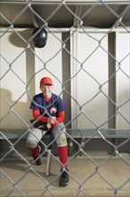 Baseball player sitting in dugout. Date : 2008
