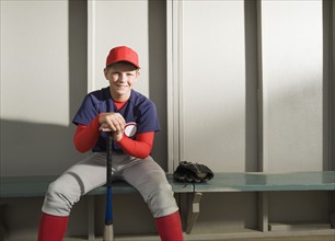 Baseball player sitting in dugout. Date : 2008